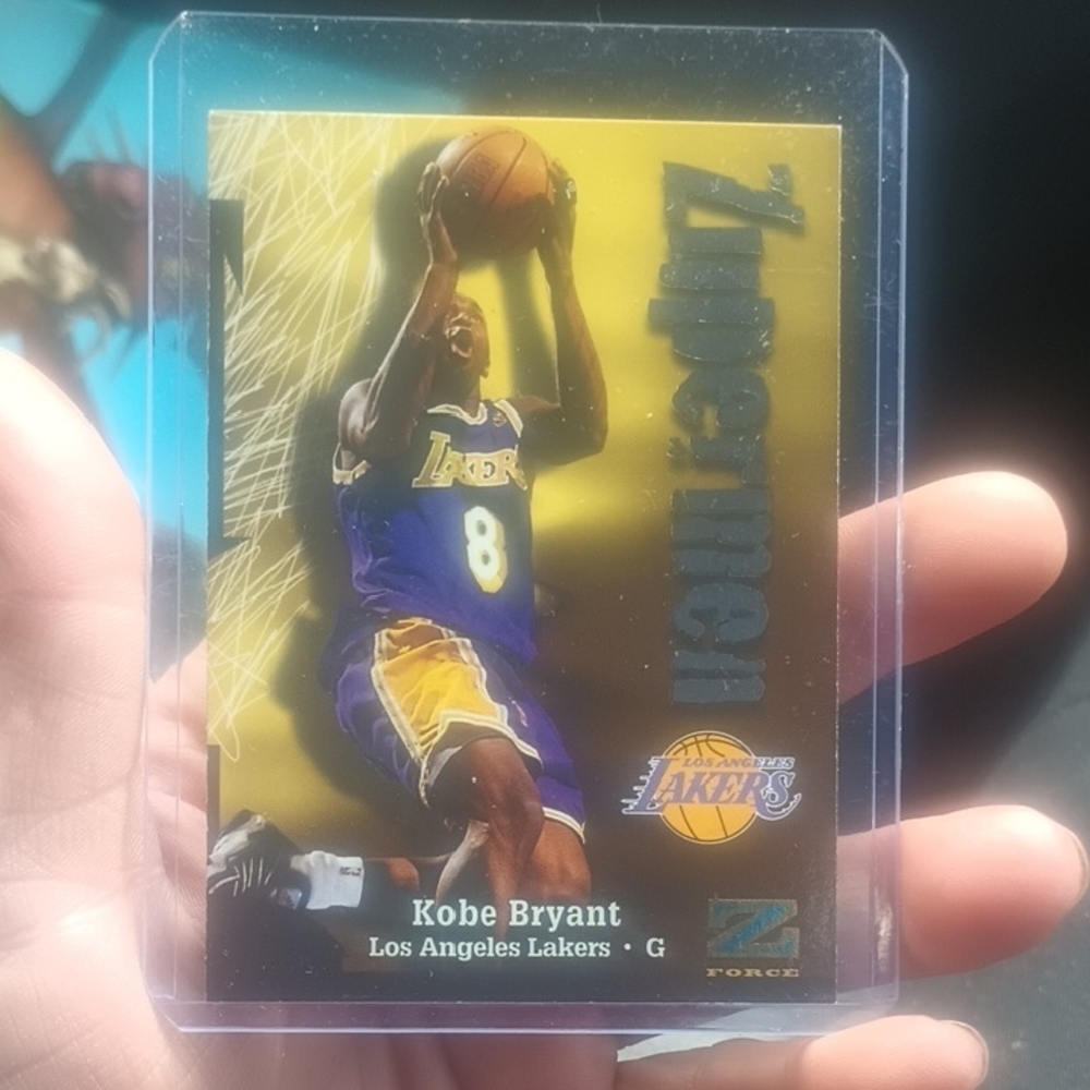Purple and Gold Card Game with Iconic Features